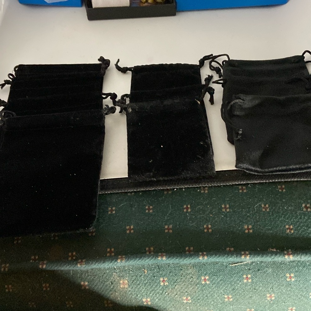 9 drawstring jewelry bags made of black velveteen